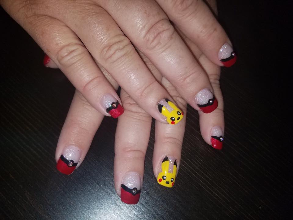 Black and red tips with Pikachu nail art